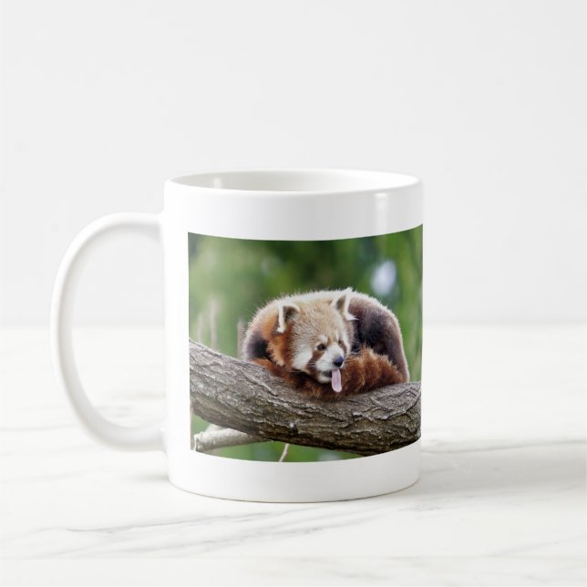 Mugg fotoröd panda. Panda roux djur. (Vänster)