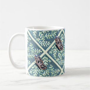 Mugg med blad och fjäll