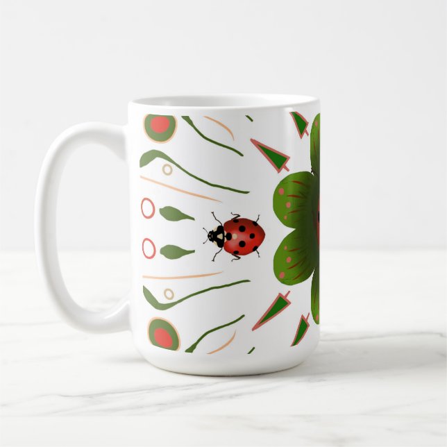 Mugg med ladybuggdesign, röd och grönt på vitt. (Vänster)