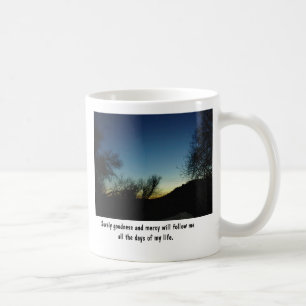 Mugg med Scripture och solnedgång som inramas i