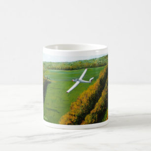 Mugg med "solo flyg över blåttberg ",