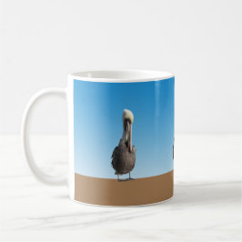 Mugg - Pelikaner på land