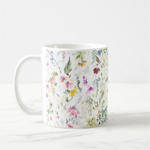 Muggen med räcker den målade vattenfärgblomman kaffemugg