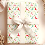 Multifärgad Jumping Hjort jul Presentpapper<br><div class="desc">Ta med dig en lekfull och festlig beröring till dina helgdag med den här multifärgaden och hoppa pappert på hjortens julomslag. Med en levande mönster av renar i rött, grönt, rosa och blått, är denna inslagna papper perfekt för att tillföra Julklapp en munter. Perfekt för julfester, presentutbyten och skapar dina...</div>