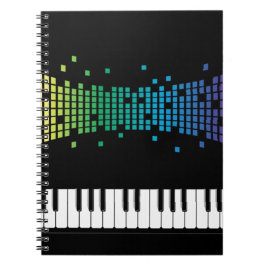 Multifärgat multifärgat tangentbord i musikpianoin anteckningsbok