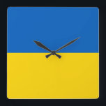 Mur Clock med Flagga från Ukraina Fyrkantig Klocka<br><div class="desc">Lägg till en distinkt beröring till ditt hem eller kontor med vår exklusiv väggklocka som omfattar Ukrainas flagga! Den här väggklockan är uppbyggd med stor noggrannhet och är mer än bara en funktionell punkt. Den är ett levande uttryck för ukrainskt pride och arv. Öga-fångstdesignen visningar på ett framträdande sätt den...</div>