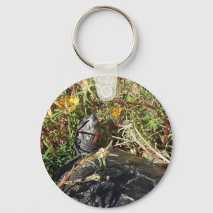 Murtle sköldpaddan i blommorna nyckelring