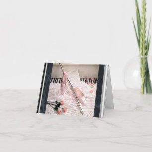 Musik av flöjten och nycklar noterar kortet kort