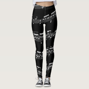 Musik bemannar och noterar damasker och tights. leggings