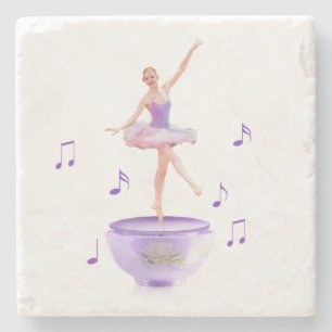 Musik boxas ballerinaen med näckrosanpassade underlägg sten