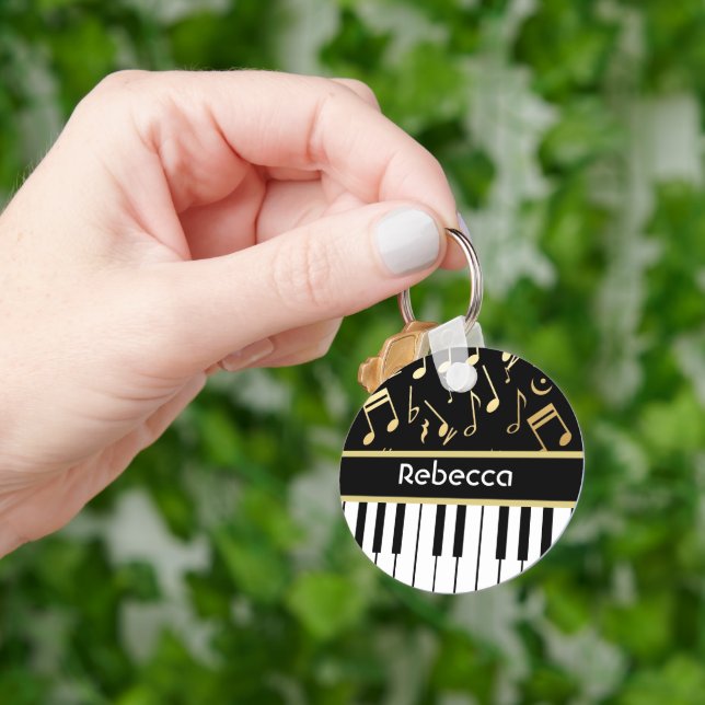 Musik noter och Piano Nycklar Black och Guld Nyckelring (Hand)