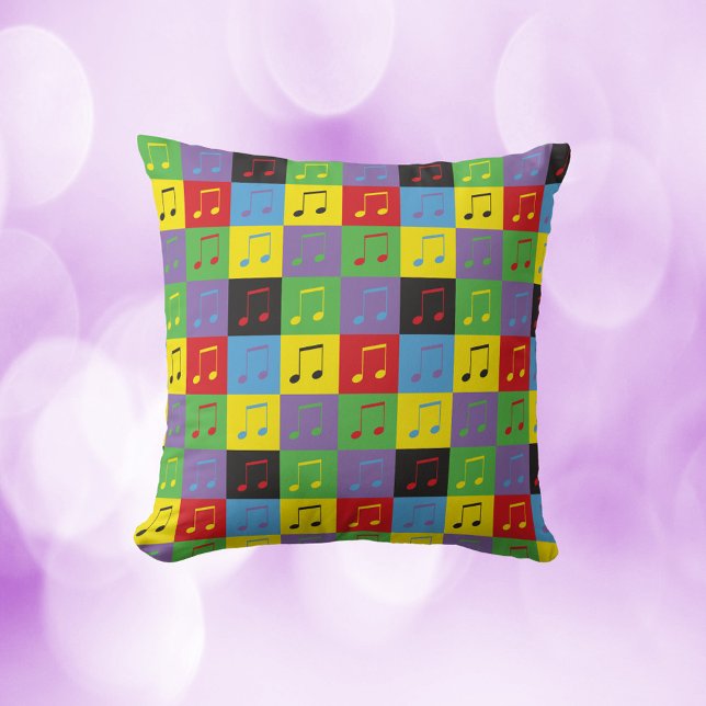 Musik noter Pop Art Mönster Kudde (A throw pillow with a pop art music note pattern)