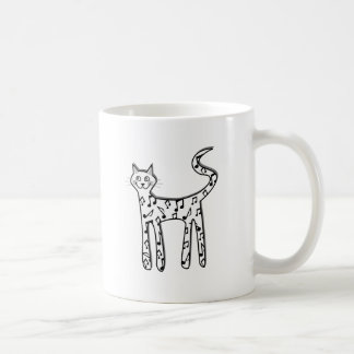Musikalen noterar katten kaffemugg