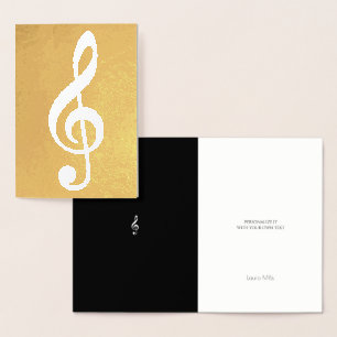 musikanteckning/treble clef på guld folierat kort