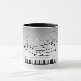 Musiktangentbord och noterar mugg