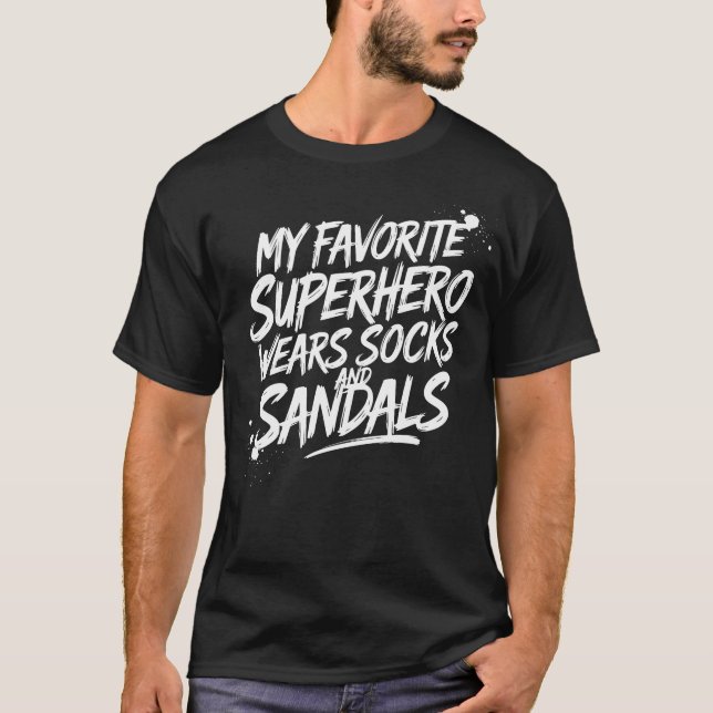 My Favorite Superhero Wears Socks and Sandals T Shirt (Framsida)