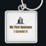 My First Business Keychain – I Earned It – Proud F Fyrkantig Silverfärgad Nyckelring<br><div class="desc">Celebrate the pride of launching your very first business! This keychain features the bold phrase "My First Business – I Earned It", perfect for anyone who worked hard to achieve this milestone. Whether it’s a startup, small business, or entrepreneurial venture, this keychain is a fun and meaningful reminder of dedication...</div>