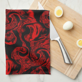 Mycket röda spiral-nedfläckader på svart bakgrund kökshandduk