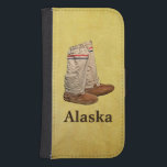Mygmma Galaxy S4 Plånbok<br><div class="desc">Mitt favoritmugglande par och text som läser "Alaska" som läggs ovanpå en braintanläderbakgrund. Långt överlägset vanliga vinterstövlar,  ett bra mjältspark och tjocka strumpor,  behållor fötterna trevliga och otäcka,  oavsett hur kall det kan vara. De behållor mina fötter varma även vid temperaturer under minus 60 Fahrenheit.</div>