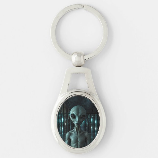 Mysterious Grey Alien Ovalt Silverfärgad Nyckelring (Framsidan)
