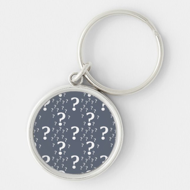 Mystoppets frågetecken, dold puzzle blue-grått rund silverfärgad nyckelring (Framsidan)