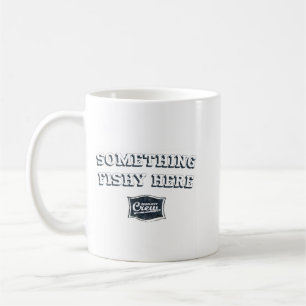 Något som är skum rånar här kaffemugg