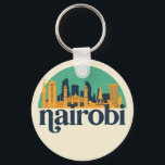 Nairobi Kenya City Skyline Retro Cityscape Art Nyckelring<br><div class="desc">Vintage- och reflexritorier med vackra skyliner, attraktion och cityscape-konst. Coola skyscraper och byggnad silhuette illustrerar handelsvara för turister och resenärer. Perfekt som souvenir att ta med sig hem när man reser värld runt. Spara minnet av din resa och semester med familj och vänner. Bakgrunden till färg kan anpassas till färg....</div>