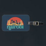 Nairobi Kenya City Skyline Vintage Cityscape Bagagebricka<br><div class="desc">Vintage- och reflexritorier med vackra skyliner,  attraktion och cityscape-konst. Coola skyscraper och byggnad silhuette illustrerar handelsvara för turister och resenärer. Perfekt som souvenir att ta med sig hem när man reser. Spara minnet av din resa och semester med familj och vänner. Bakgrunden till färg kan anpassas till färg.</div>