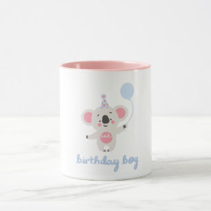Nalle för födelsedagstjocklek med en ballong mugg