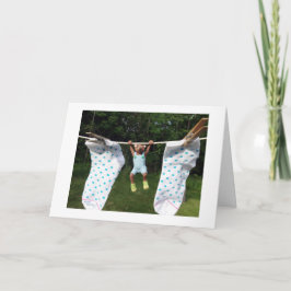 Nalle i socklar på en klädlinje kort