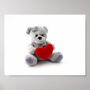 Nalle Leksak som håller ett hjärta på vit bakgrund Poster