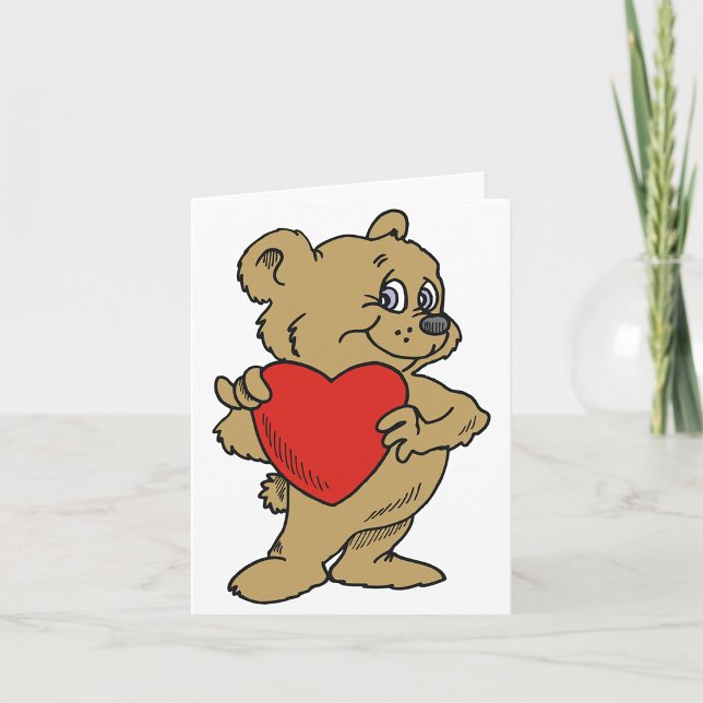 Nalle som håller ett rött hjärta-kort helgkort (Skapare uppladdad)