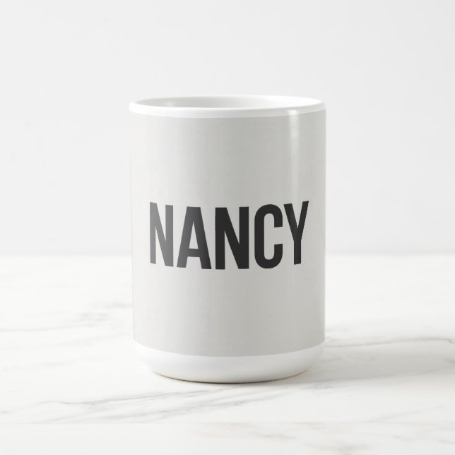 Nancy Kaffemugg (Center)
