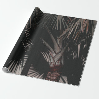 NÄRA FOTOGRAFI AV GRÖNT SOM LÄMNATS HANDFLATAN PRESENTPAPPER