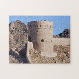 Nära på en klocka torn i gammal Muscat - Oman Pussel
