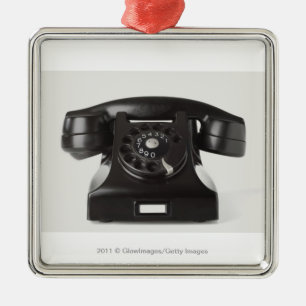 Närbild av en roterande telefon julgransprydnad metall