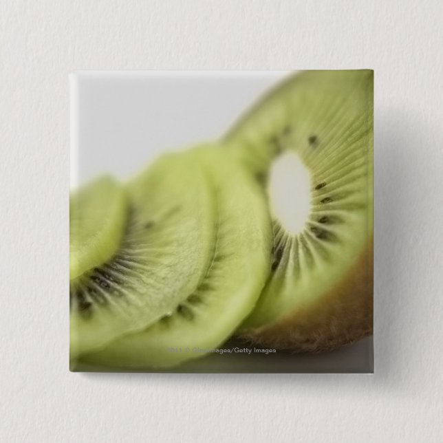 Närbild av kiwiskivor knapp (Framsida)