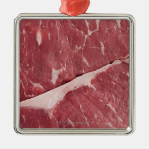 Närbild av rå steak julgransprydnad metall