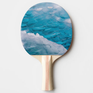 Närbild på blå is pingisracket