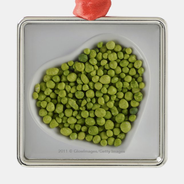 Närbilden av grön småsten i en hjärta formar julgransprydnad metall (Framsidan)