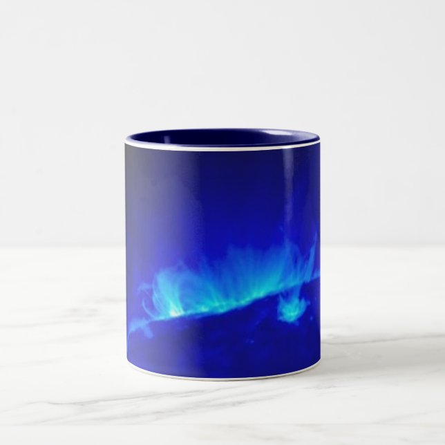 NASA/sol- avbildar först från den tvilling- Två-Tonad Mugg (Center)