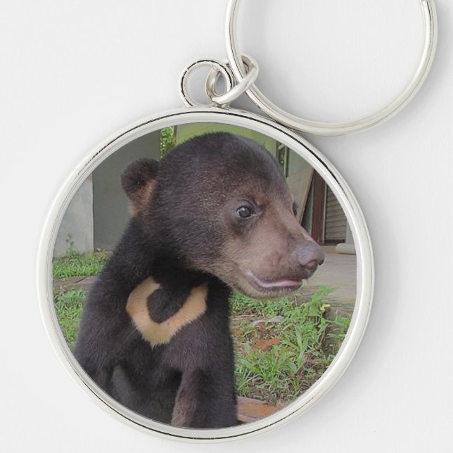 NATALIE RUND SILVERFÄRGAD NYCKELRING (Framsidan)