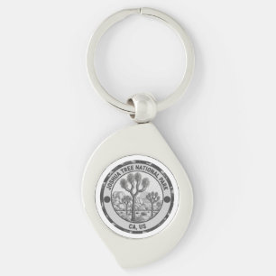 🌵 Nationella Park Souvenirer & Resminnen Swirl Silverfärgad Nyckelring