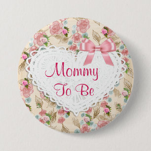Nätt blom- mammor som är baby shower, knäppas knapp