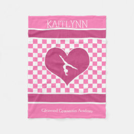 Nätt rosa rutig gymnastik med monogramen fleecefilt