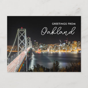 Nattlig Stadssiluett Hälsningar från Oakland Postk Vykort