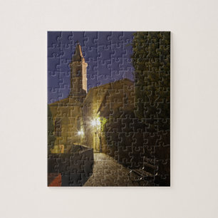 Nattvy av kyrka i skymningen, Pienza, Italien Pussel