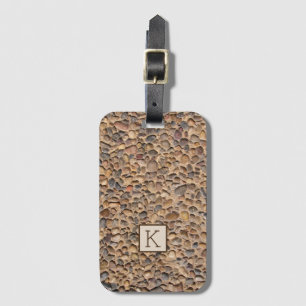 Naturpebblen stenar fotoet med monogramen bagagebricka