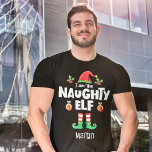 Naughty elf-familjens matchande julomsutrustning i t shirt<br><div class="desc">Gå in i helgdag med den här humoristiska naughty elf t-shirt som ingår i en passande familjens egen utrustningssamling som innehåller gåvor till någon familjemedlem. Perfekt för en återförening av julfamiljen, den här t-shirt-skjortan har en söt elfhatt och roligt ben, med texten "Naughty elf" i ett vitt, modernt, versaltypsnitt. Skjortan...</div>
