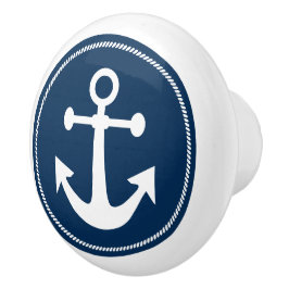 Nautical ankare med rep på marinblå knopp